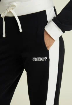 Freddy Pantaloni neri con bande laterali bianche-Donna Pantaloni Sportivi