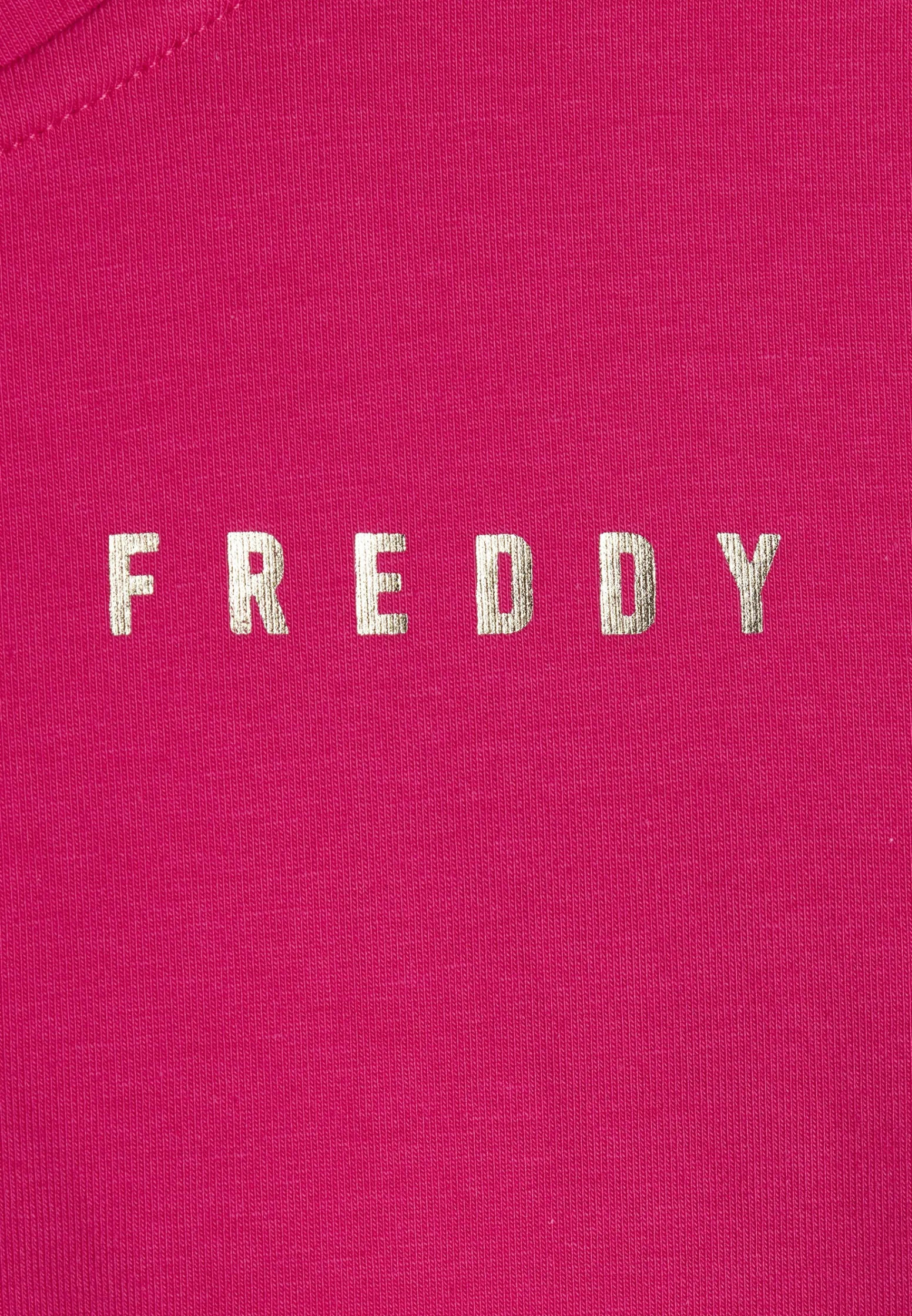 Freddy Tuta donna con zip, collo alto e spacchi laterali su fondo gamba-Donna Tute
